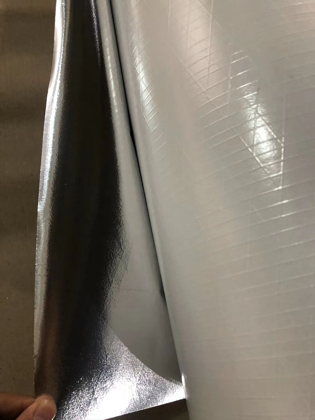 White PP+scrim+metallized film for color steel tile insulation