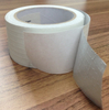 Single roll scene shot of white PP scrim tape, residue-free abrasion resistance for construction material transit protection