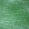 Flat texture shot of green anti-slip coated side, textured surface for friction enhancement on roof deck