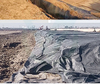 Construction site laying of black woven geotextile, soil anti-seepage & road base reinforcement application