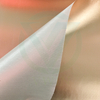 Close-up of surface texture and metallic luster of gold aluminum foil laminated fiberglass cloth