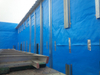 Blue double foil woven fabric wrapped steel workshop wall, heat moisture & rust resistant