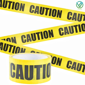 Main shot of yellow caution warning tape for buried gas pipeline, bold black CAUTION print, buried underground to prevent gas pipe damage during excavation