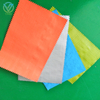 Multi-color swatch of kraft laminated woven fabric, orange primary color for mattress & sofa furniture packaging