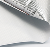 Folded close-up of MPET woven laminate, tear-resistant grid base with vapor lock aluminum film for roof construction