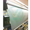 Non‑punch fabric night curtain installed on retail shop display case on‑site scene