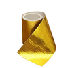 Folded glossy texture close-up of gold fiberglass foil tape, flexible fiberglass substrate for irregular pipe thermal wrapping