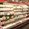 Perforated energy‑saving night cover for long open‑type supermarket refrigerated display counter