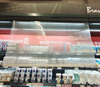Breathable plastic night blind installed on supermarket refrigerating cabinet, real‑store application scene
