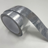 Diagonal folded shot of reflective flame retardant foil tape, mirror heat reflection for HVAC pipe and roof protection