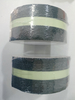 Two stacked rolls of black-green luminous anti slip tape, standard stripe design for large factory walkway construction