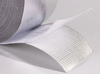 Flat lay soft light shot of fiberglass foil tape, flexible easy cut for chemical HVAC pipe joint anti-corrosion sealing