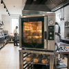 Commercial bakery oven with thermal insulation cover made of heat resistant MPET woven laminate