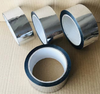 Stacked rolls of metallized polyester tape with glossy abrasion-resistant surface, bulk supply for electronic workshop projects