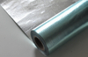 Matte silver dual foil laminated woven roll, soft radiant heat reflection without harsh glare