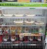 Perforated durable plastic night cover fitted on deli and bakery refrigerated display showcase