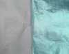 Foil-bubble composite panel, moisture heat fire barrier facing