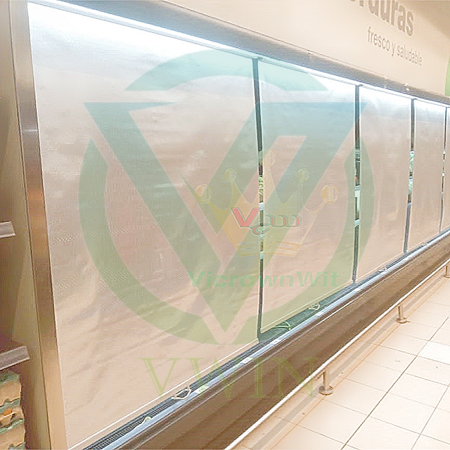 Real‑scene installation photo of perforated customized night curtain on commercial showcase