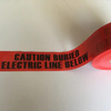 Simulated laying rendering of underground warning tape buried above cables to avoid cable damage during excavation