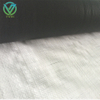 Close-up of white reflective side of PE laminated woven fabric, smooth dense surface for light-sensitive goods packaging