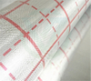 Flat-lay of aluminum foil fiberglass fabric with dark line printing