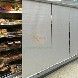 Custom perforated auto night curtain for beverage refrigeration unit