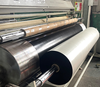Factory production shot of black kraft laminated woven roll, stable lamination for stone, wood board packaging