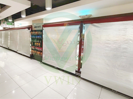 Real‑scene installation of customized anti‑bacterial perforated night cover on supermarket showcase